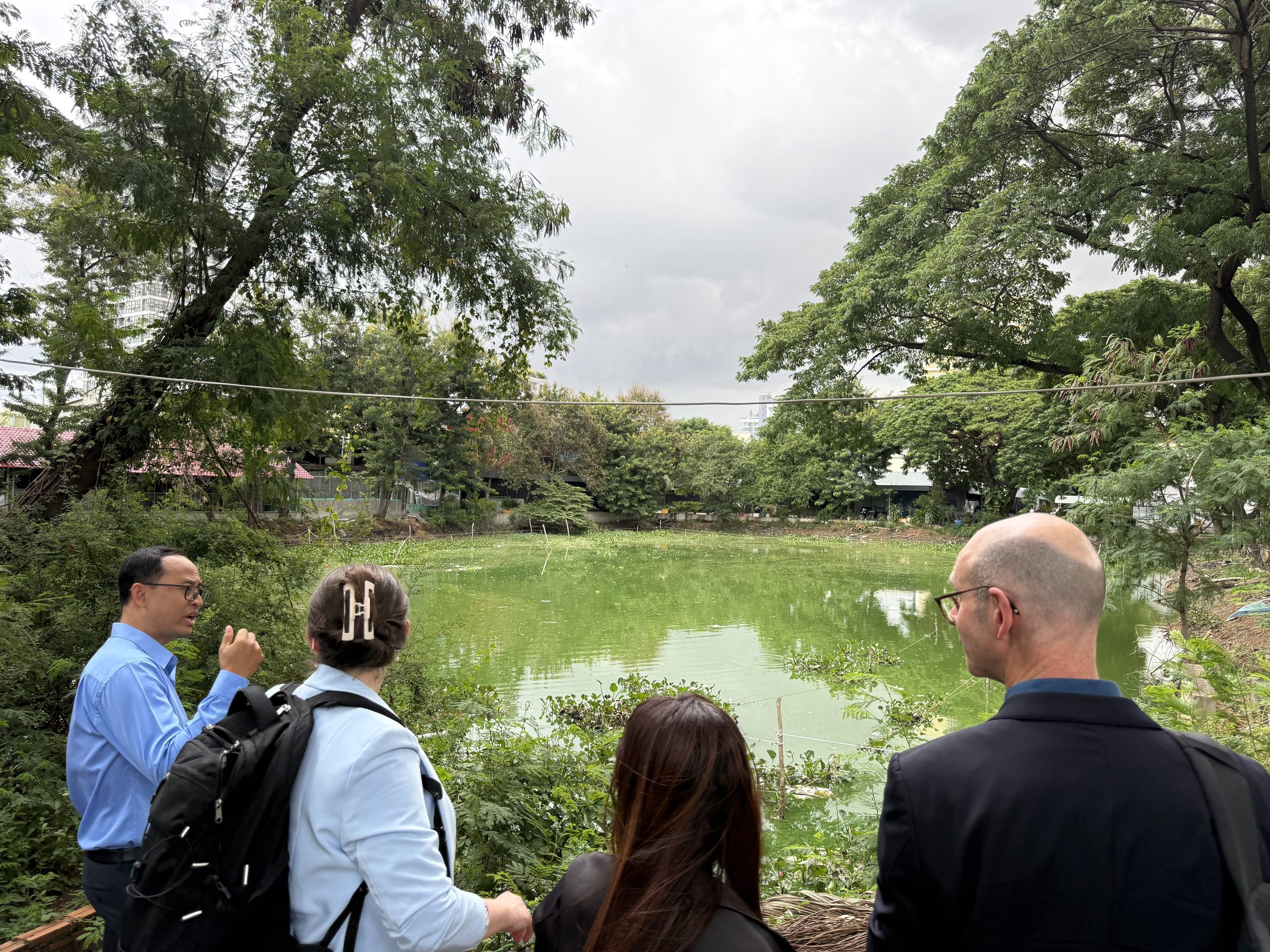 Assessing an urban lake during a site visit in Phnom Penh.